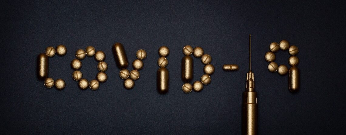 Covid 19 spelled out with pills